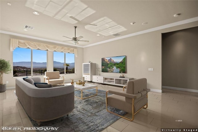living area with ornamental molding, visible vents, a ceiling fan, light tile patterned floors, and baseboards