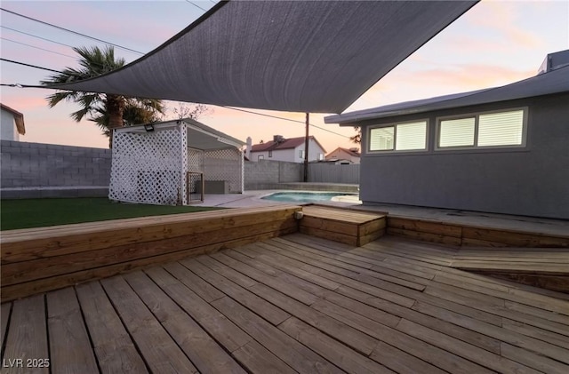 deck featuring a fenced backyard
