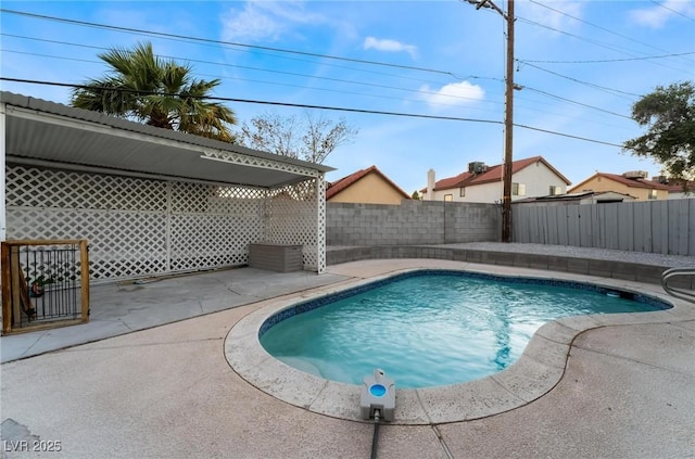 view of pool with a fenced backyard, a fenced in pool, and a patio