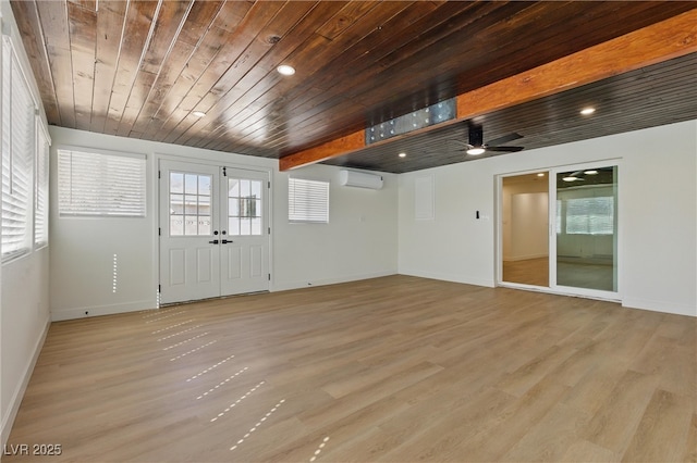 613 Kings Pl, Boulder City, NV 89005 - interior space featuring light wood-style floors, wooden ceiling, baseboards, and a wall unit AC