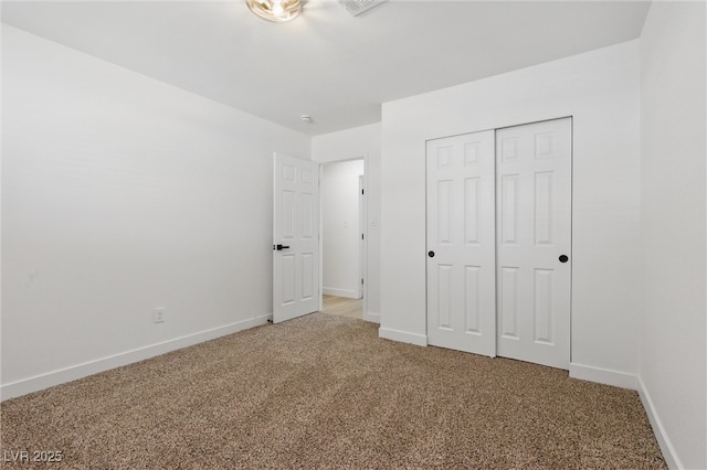 613 Kings Pl, Boulder City, NV 89005 - unfurnished bedroom featuring baseboards, light carpet, and a closet