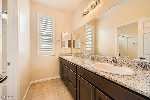 8318 Sonora Del Sol St, Las Vegas, NV 89113 - full bathroom featuring double vanity, tile patterned floors, and baseboards