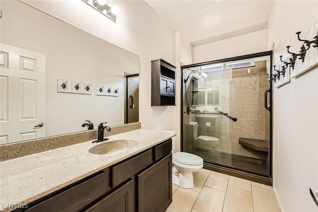 8318 Sonora Del Sol St, Las Vegas, NV 89113 - bathroom featuring toilet, tile patterned floors, vanity, and a shower stall