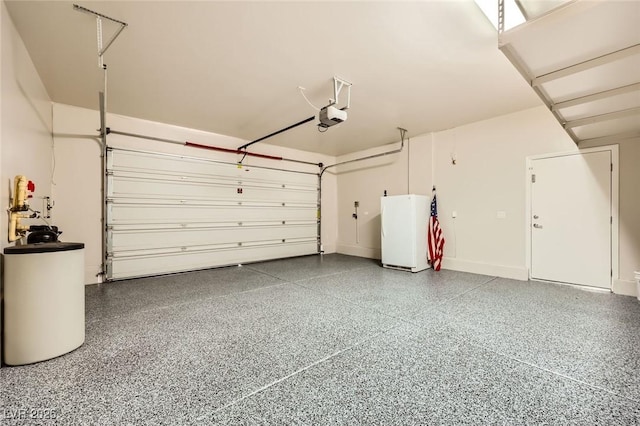 8318 Sonora Del Sol St, Las Vegas, NV 89113 - garage with freestanding refrigerator and a garage door opener