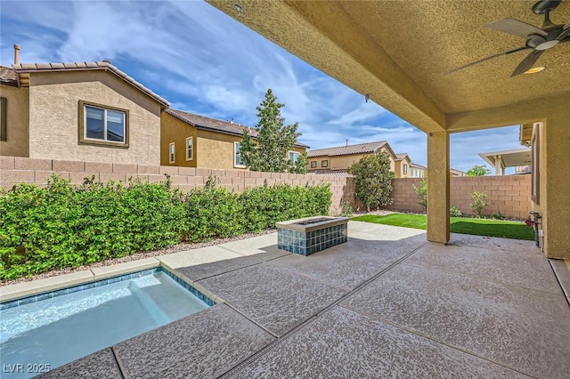 8318 Sonora Del Sol St, Las Vegas, NV 89113 - fenced backyard with a patio area and ceiling fan