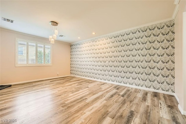 8318 Sonora Del Sol St, Las Vegas, NV 89113 - empty room with ornamental molding, wallpapered walls, baseboards, and wood finished floors