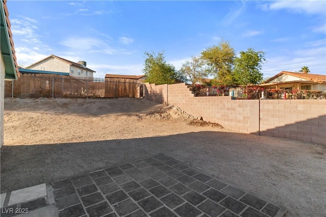view of yard featuring a fenced backyard