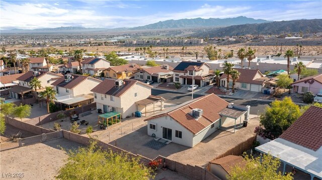 aerial view with a mountain view and a residential view