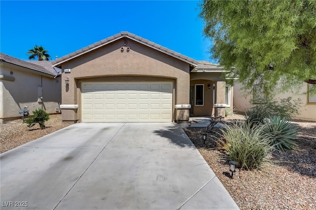 448 Bright Moon Ave, North Las Vegas, NV 89084 - ranch-style house with stucco siding, an attached garage, driveway, and a tile roof