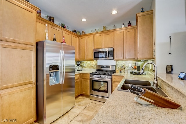 448 Bright Moon Ave, North Las Vegas, NV 89084 - kitchen featuring stainless steel appliances, a sink, backsplash, recessed lighting, and light tile patterned flooring