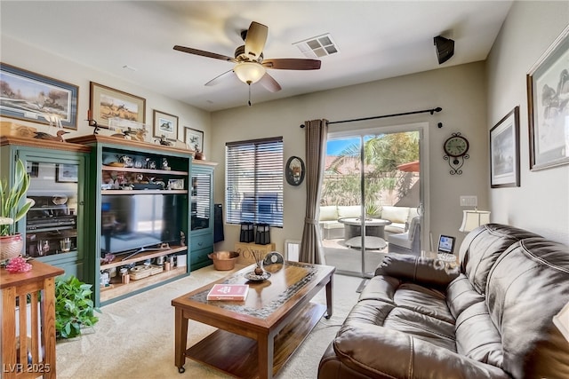 448 Bright Moon Ave, North Las Vegas, NV 89084 - living room with light carpet and a ceiling fan
