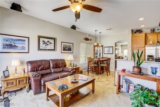 448 Bright Moon Ave, North Las Vegas, NV 89084 - living room featuring arched walkways, ceiling fan, light colored carpet, recessed lighting, and baseboards