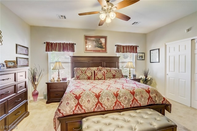 448 Bright Moon Ave, North Las Vegas, NV 89084 - bedroom featuring light carpet, multiple windows, and a ceiling fan