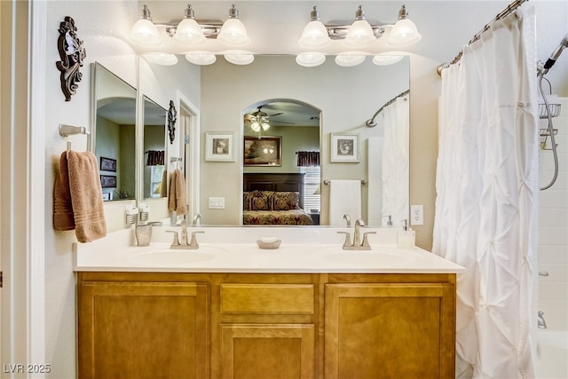 448 Bright Moon Ave, North Las Vegas, NV 89084 - ensuite bathroom featuring ceiling fan, double vanity, and shower / bathtub combination with curtain