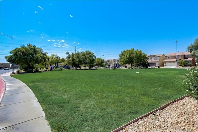448 Bright Moon Ave, North Las Vegas, NV 89084 - view of home's community featuring a yard