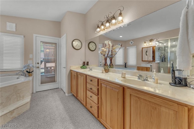 4878 Friar Tuck Ave, Las Vegas, NV 89130 - full bathroom featuring plenty of natural light, double vanity, and a garden tub