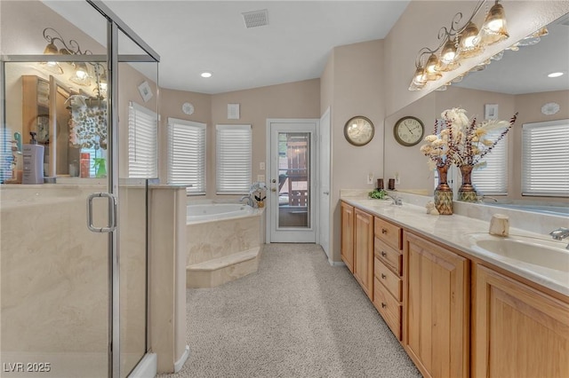 4878 Friar Tuck Ave, Las Vegas, NV 89130 - bathroom with a stall shower, double vanity, and a garden tub