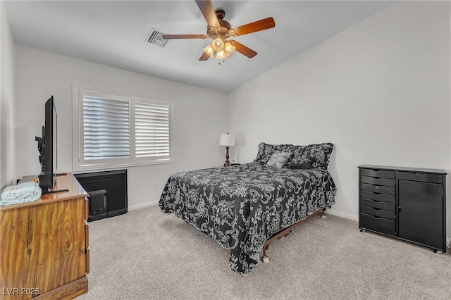 4878 Friar Tuck Ave, Las Vegas, NV 89130 - bedroom featuring light colored carpet, baseboards, and a ceiling fan