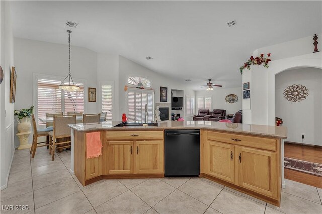 4878 Friar Tuck Ave, Las Vegas, NV 89130 - kitchen featuring dishwasher, a ceiling fan, light tile patterned flooring, light brown cabinets, and open floor plan