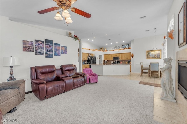 4878 Friar Tuck Ave, Las Vegas, NV 89130 - living area featuring a ceiling fan, recessed lighting, light tile patterned floors, and light colored carpet