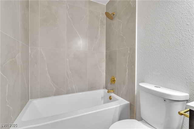 full bathroom featuring toilet, a textured wall, and  shower combination