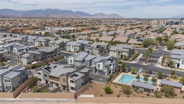 birds eye view of property with a residential view and a mountain view