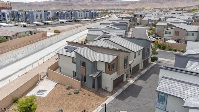 bird's eye view featuring a mountain view and a residential view