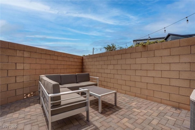 view of patio / terrace with a fenced backyard and an outdoor hangout area