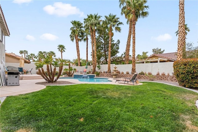 1430 October Oak Ave, Las Vegas, NV 89123 - view of yard featuring a patio area, a fenced backyard, and a fenced in pool