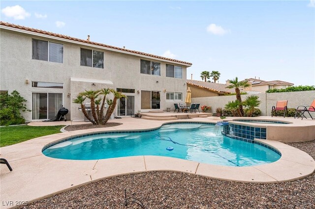 1430 October Oak Ave, Las Vegas, NV 89123 - view of pool with a patio area, fence, an in ground hot tub, and a fenced in pool