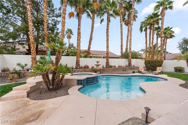 1430 October Oak Ave, Las Vegas, NV 89123 - view of swimming pool featuring a fenced backyard, a pool with connected hot tub, and a patio