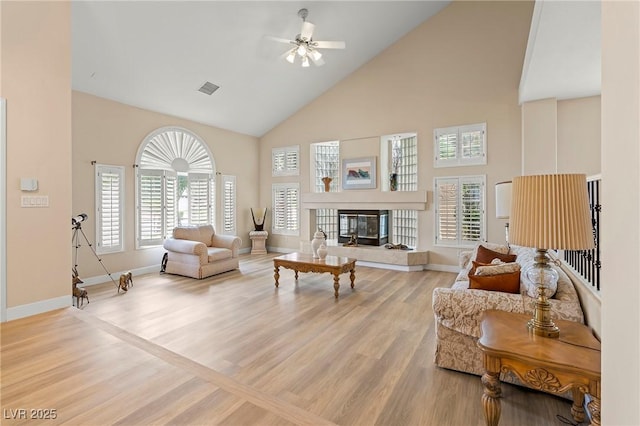 1430 October Oak Ave, Las Vegas, NV 89123 - living area with baseboards, a ceiling fan, visible vents, high vaulted ceiling, and wood finished floors