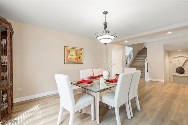 1430 October Oak Ave, Las Vegas, NV 89123 - dining area featuring light wood finished floors, baseboards, recessed lighting, and stairway