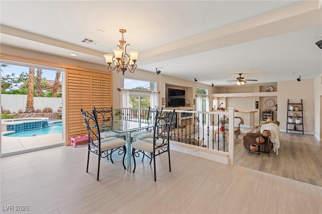 1430 October Oak Ave, Las Vegas, NV 89123 - dining space with wood finished floors, ceiling fan with notable chandelier, and visible vents