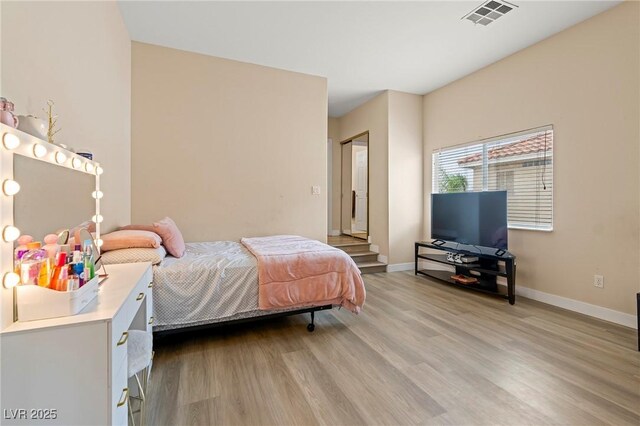 1430 October Oak Ave, Las Vegas, NV 89123 - bedroom with visible vents, baseboards, and wood finished floors