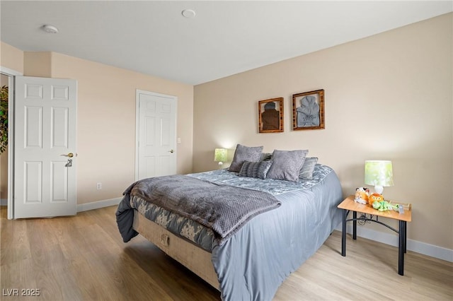 1430 October Oak Ave, Las Vegas, NV 89123 - bedroom featuring wood finished floors and baseboards