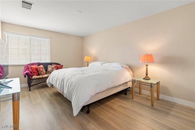 1430 October Oak Ave, Las Vegas, NV 89123 - bedroom with light wood-type flooring, baseboards, and visible vents