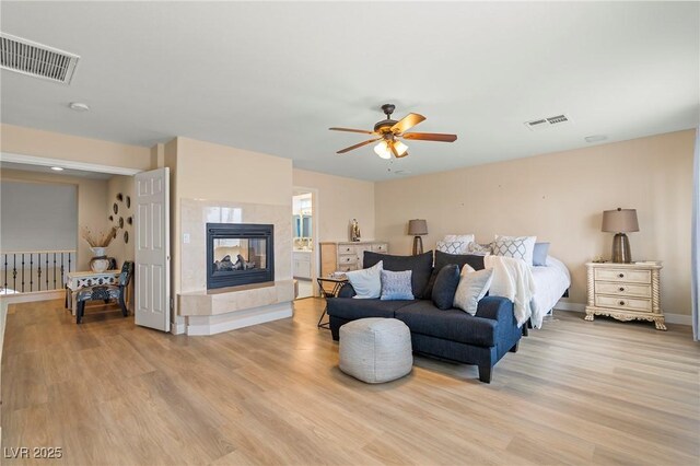 1430 October Oak Ave, Las Vegas, NV 89123 - bedroom with visible vents, baseboards, and light wood finished floors