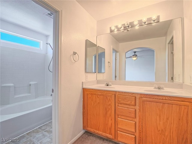 5929 Sleepy Fawn Dr, Las Vegas, NV 89142 - full bath with double vanity, visible vents, a sink, and a ceiling fan