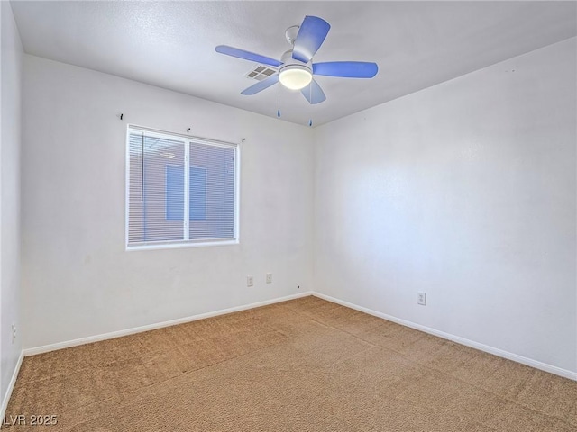 5929 Sleepy Fawn Dr, Las Vegas, NV 89142 - spare room with baseboards, a ceiling fan, and carpet