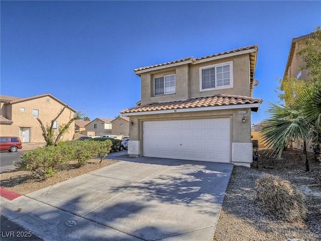 5929 Sleepy Fawn Dr, Las Vegas, NV 89142 - view of front of house with a tiled roof, a garage, driveway, and stucco siding