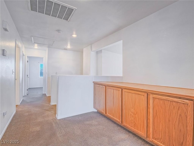 5929 Sleepy Fawn Dr, Las Vegas, NV 89142 - hallway with light colored carpet, baseboards, visible vents, and recessed lighting