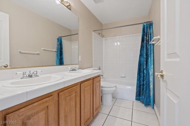 full bathroom featuring shower / bath combination with curtain, tile patterned flooring, double vanity, and a sink