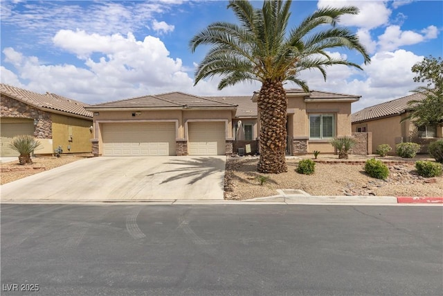 ranch-style home with concrete driveway, stone siding, stucco siding, and a garage