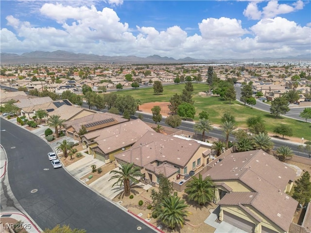 bird's eye view with a residential view and a mountain view