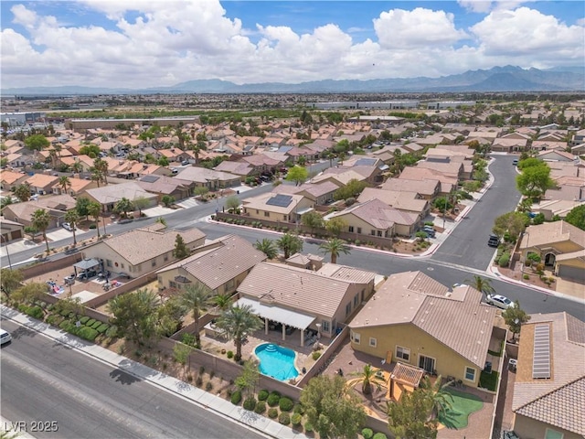 drone / aerial view with a mountain view and a residential view