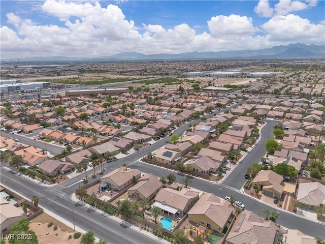 aerial view featuring a residential view and a mountain view