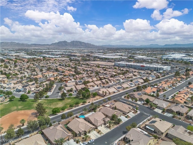 bird's eye view featuring a residential view and a mountain view