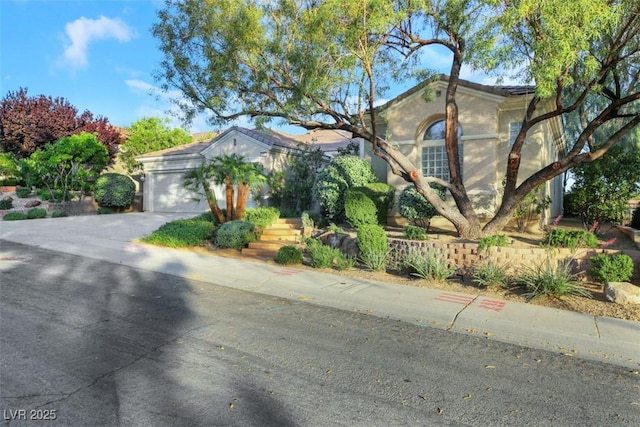 1805 Prichard Ave, Henderson, NV 89052 - view of front of house with stucco siding, a garage, and concrete driveway