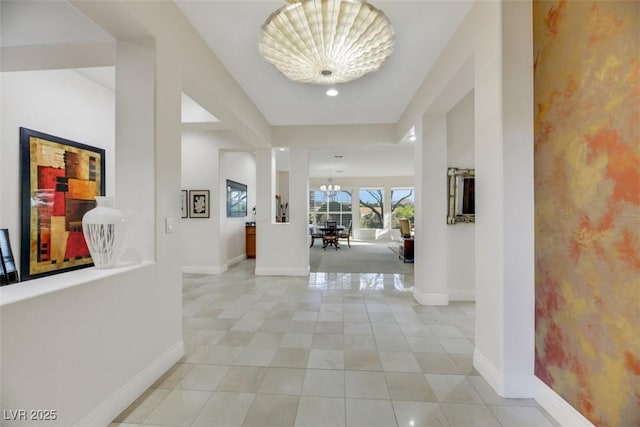 1805 Prichard Ave, Henderson, NV 89052 - hall with recessed lighting, a notable chandelier, baseboards, and light tile patterned flooring